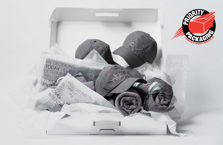 box full of hats and T-shirts - custom product packaging